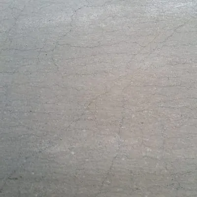 Graue Steintextur mit Rissen